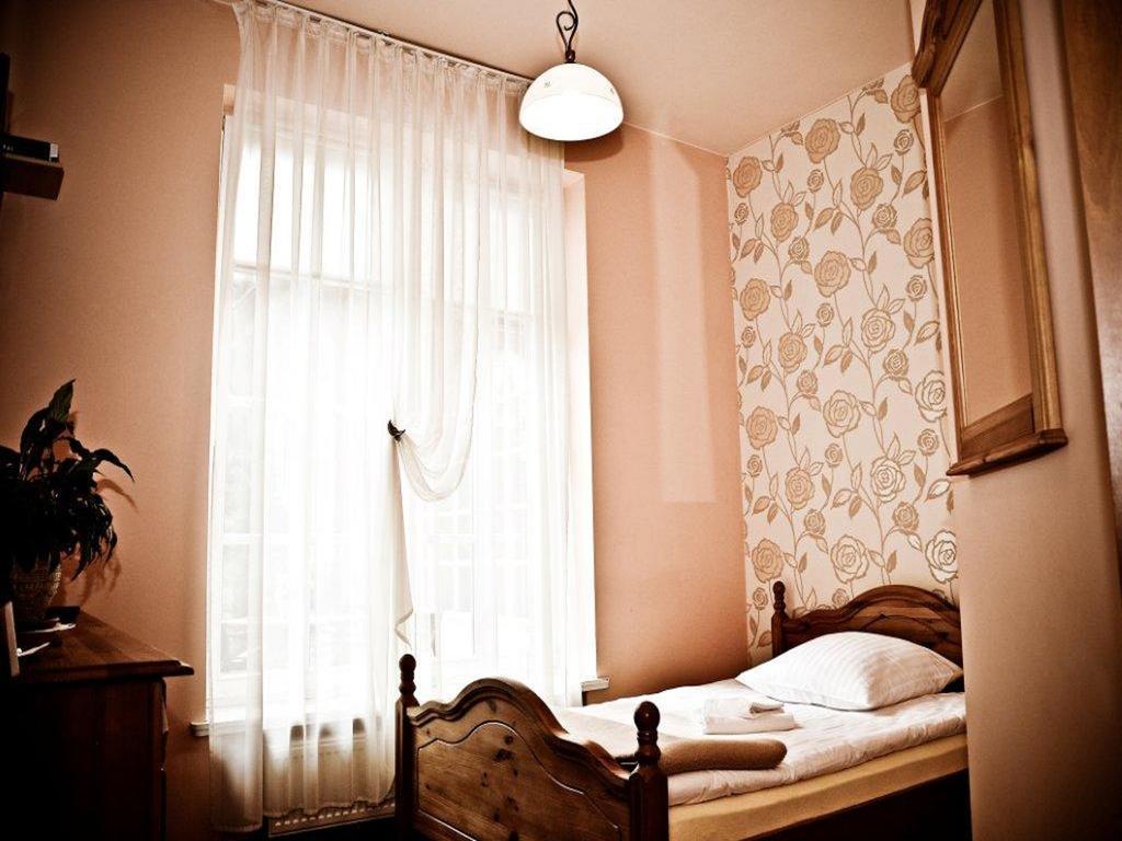 Pensjonat Zacisze Plewiska Rom bilde